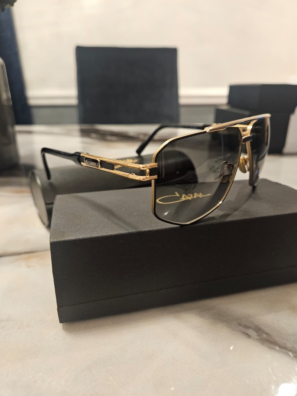 Cazal Gold Frame Sunglasses with Black Temples and Gradient Lenses